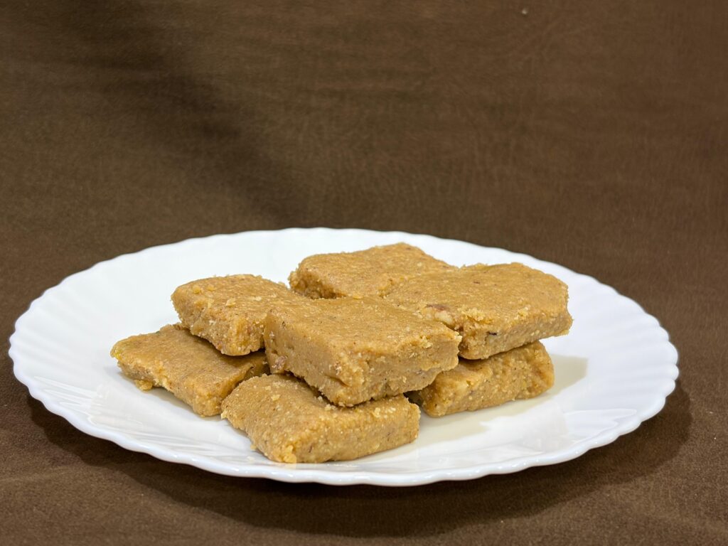 Premium dry fruit sukhdi made with jaggery, desi ghee and rich dry fruits.
